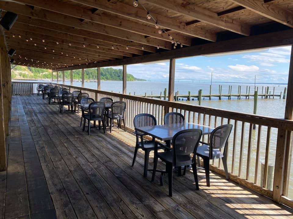 The outdoor waterfront deck at Capt Billy's Crab House