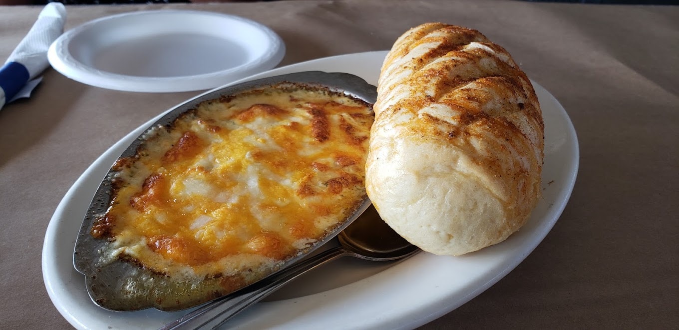 Capt Billy's baked seafood dip with toasted baguette