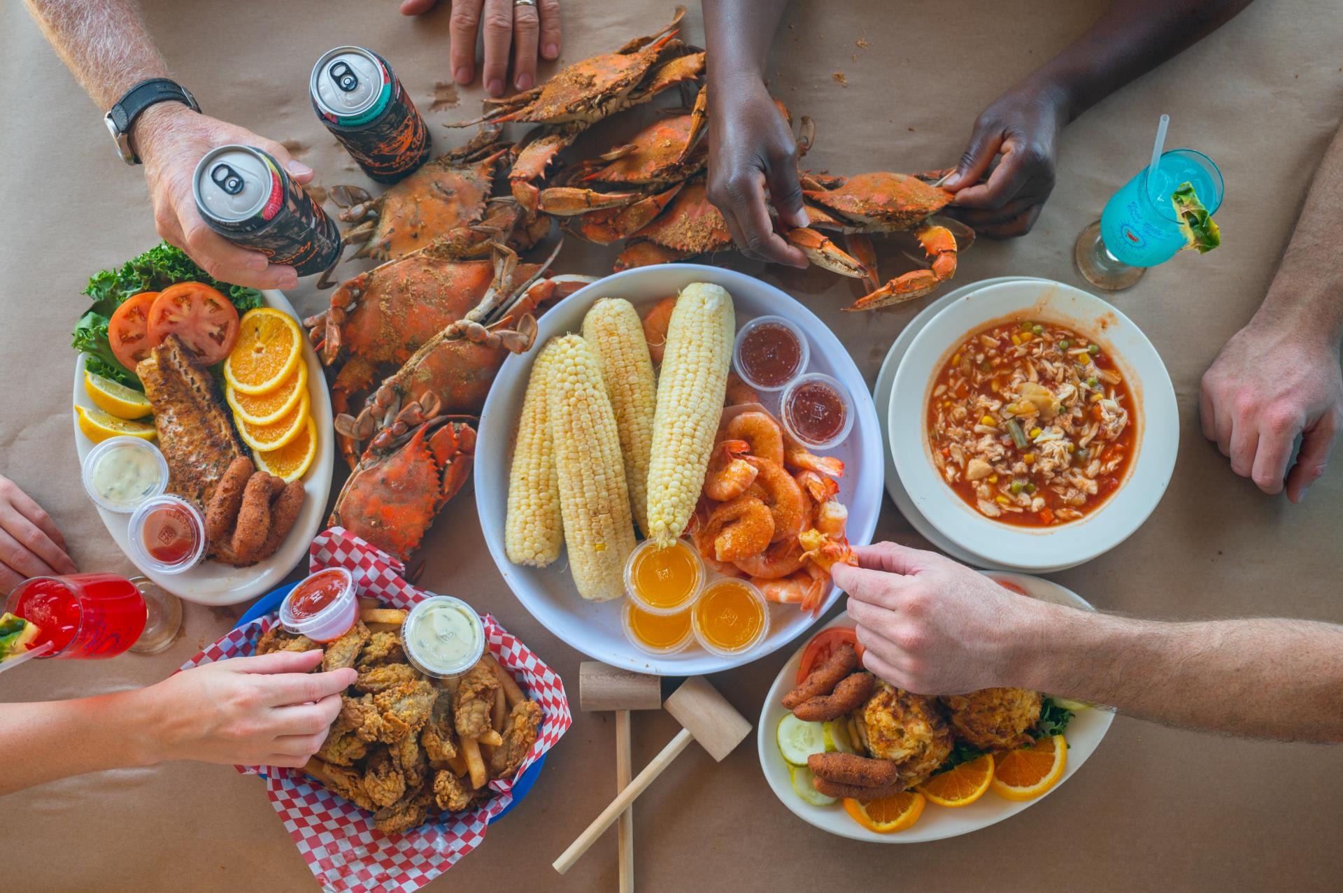 Full spread at Capt Billy's — crabs, shrimp, corn, crab soup, crab cakes, and fried seafood